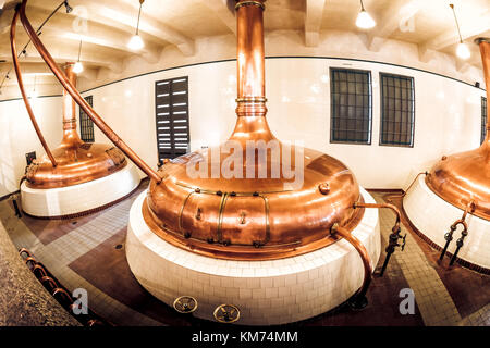PILSEN (PLZEN), CZECH REPUBLIC - MAY 22, 2017: Copper distillery tanks in old brewery in Pilsner Urquell Brewery Stock Photo