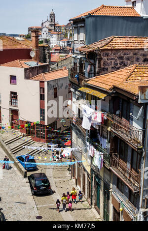 Porto Portugal,Baixa,residential apartment building,city skyline,rooftops,ceramic tiles,historic center,buildings,street,balcony,overhead view,clothes Stock Photo