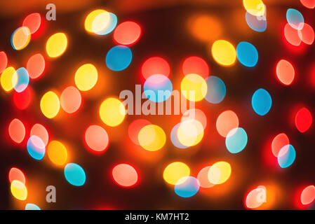 Bokeh. New Year bokeh background. Christmas abstract background with colorful bokeh defocused lights for holiday design. Concept. Blurred garland Stock Photo