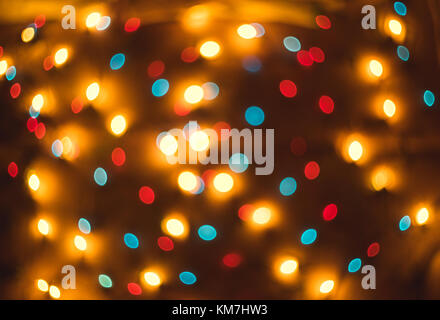 Bokeh. New Year bokeh background. Christmas abstract background with colorful bokeh defocused lights for holiday design. Concept. Blurred garland Stock Photo