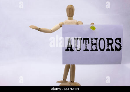 Conceptual hand writing text caption inspiration showing Authors Business concept for Word Message Text Typography written sticky note sculpture backg Stock Photo