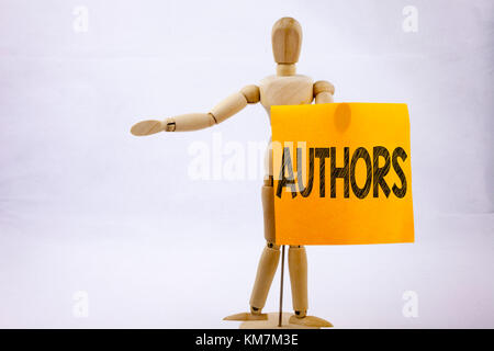 Conceptual hand writing text caption inspiration showing Authors Business concept for Word Message Text Typography on sticky note sculpture background Stock Photo