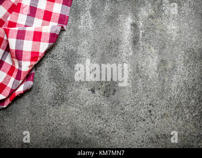 Serving background. Textile napkin. On rustic background. Stock Photo