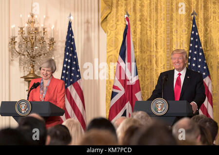 President Donald Trump and British Prime Minister Theresa May appear at a joint press conference, Friday, Jan. 27, 2017, in the East Room of the White House in Washington, D.C. Stock Photo
