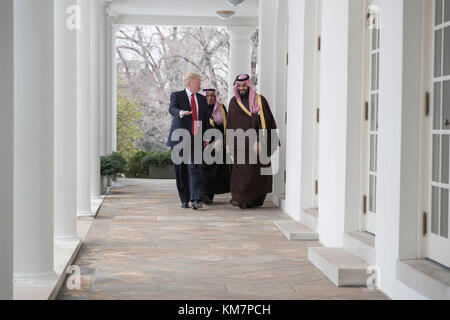 President Donald Trump walks with the Saudi Arabia’s Deputy Crown Prince Mohammed bin Salman, Tuesday, March 14, 2017, along the Colonnade outside the Oval Office of the White House in Washington, D.C. Stock Photo