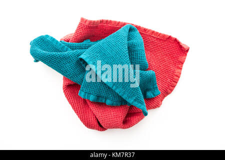 Messy crumpled colorful kitchen towels, on white background. Stock Photo