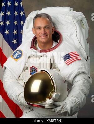 Official portrait of NASA STS-117 and STS-128 mission astronaut John ÒDannyÓ Olivas in a spacesuit at the Johnson Space Center Photo Studio September 18, 2006 in Houston, Texas.  (photo by NASA Photo  via Planetpix) Stock Photo