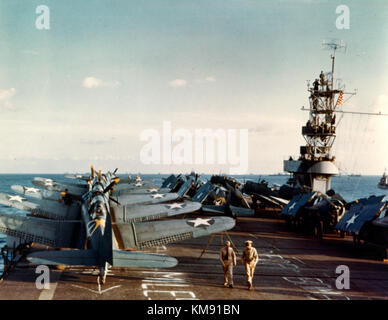 USS Santee (ACV-29)  Douglas SBD-3 Dauntless scout-bombers and Grumman F4F-4 Wildcat fighters on the ship's flight deck during Operation Torch, the November 1942 invasion of North Africa. Stock Photo