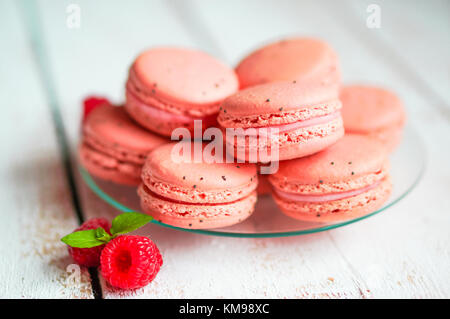 Raspberry Macaroons With Berries On Wooden Table Stock Photo