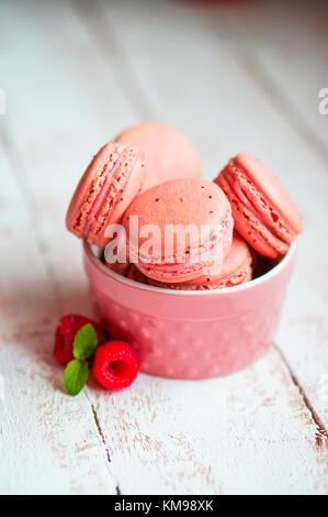 Raspberry Macaroons With Berries On Wooden Table Stock Photo