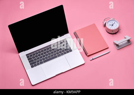 Mock up laptop, notebook on young student desk. Cyan pastel colors. Stock Photo