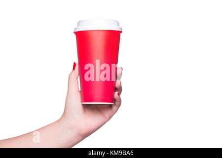 Mockup of female hand holding a Coffee paper cup isolated on dark ...
