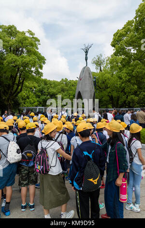 Hiroshima, Japan - May 25, 2017: Students gathering at the Children's Peace Monument in Hiroshima Peace Memorial Park in memory of atomic bombing vict Stock Photo