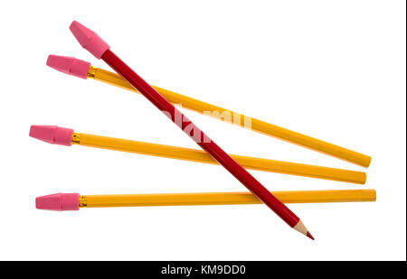 Top view of a yellow and a single red artist pencil with eraser caps isolated on a white background. Stock Photo