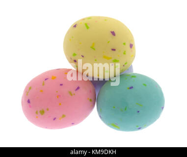 Several speckled Easter egg malt ball candies isolated on a white background. Stock Photo