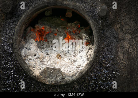 Burning Coals In The Bitumen Melting Furnace For Road Works. Bitumen ...