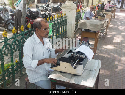 Street typist  on footpath at Mysore, Mysuru, Karnataka, India. Stock Photo