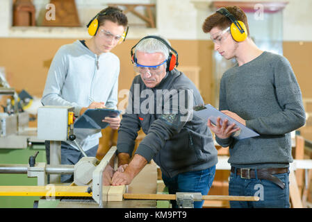 Male students in a woodwork class Stock Photo