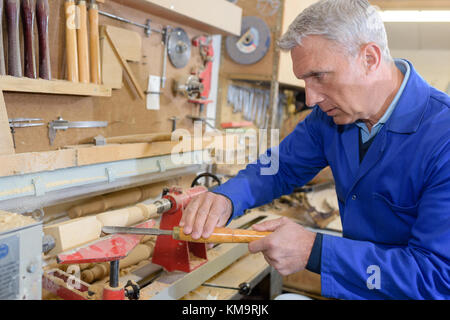 close-up portrait of senior carpenter at work Stock Photo