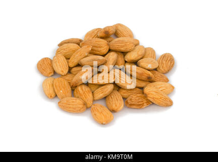 Pile of Roasted almonds nuts isolated on white background Stock Photo