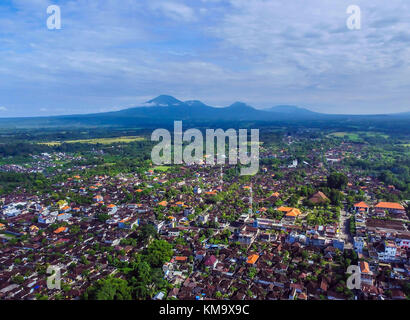 The city of Tabanan with mount Batukaru in the background Stock Photo