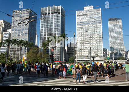 People walking at a crosswalk, crossing street at Praca Ramos de Azevedo, Republica, downtown Sao Paulo, Brazil Stock Photo