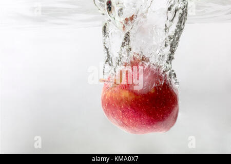 Apple splash water Stock Photo