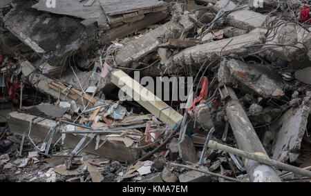 Concrete wreckage closeup of a destroyed building isolated on a white ...