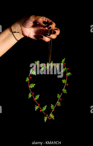 heart shape made from Christmas flower Stock Photo