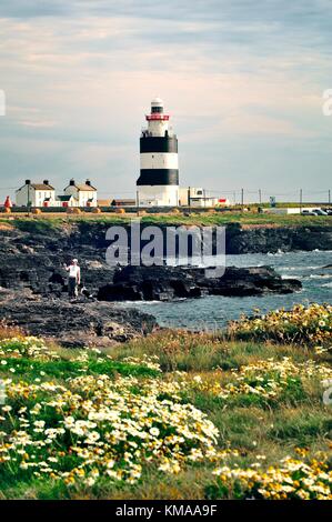 Hook Head lighthouse at the mouth of the River Barrow and Waterford Harbour in County Wexford Ireland dates from the 13th C. Stock Photo