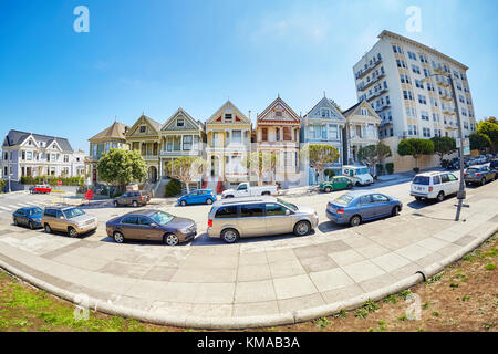 San Francisco, USA - August 24, 2015: Fisheye lens picture of the Painted Ladies houses by Steiner Street on a beautiful summer day. Stock Photo