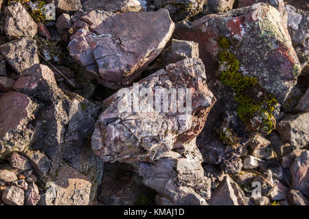 A close up of vitrified stone at the ruins of Iron Age Tap O Noth hill fort on Hill O Noth near Rhynie, Aberdeenshire, Scotland Stock Photo