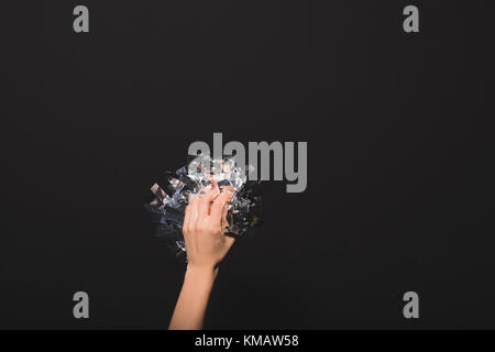 woman holding confetti in hands Stock Photo