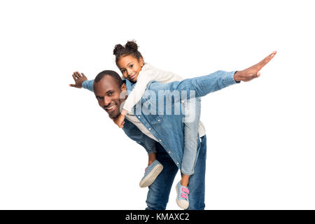 father piggybacking daughter Stock Photo