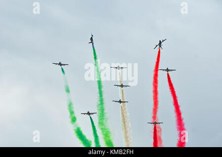 SION, SWITZERLAND - SEPTEMBER 17: Frecce Tricolri trailing smoke in the Breitling Air Show:  September  17, 2017 in Sion, Switzerland Stock Photo