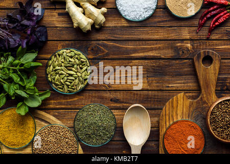 various spices on wooden surface Stock Photo
