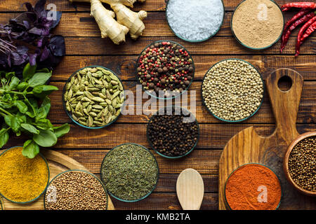 various spices on wooden surface Stock Photo