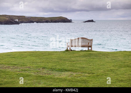 An empty bench overlooking Fistral in Newquay Cornwall UK. Stock Photo
