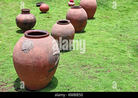 Large old style clay storage jars, pots and jugs used in rural Goa, India Stock Photo