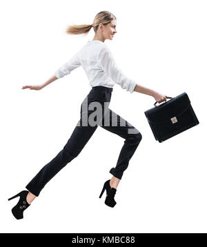 Happy young woman in formal wear jumping . Stock Photo