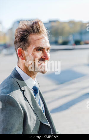 head portrait picture of a businessman who walks in the city Stock Photo