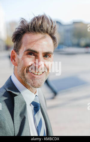 head portrait picture of a businessman who smiles in the camera Stock Photo