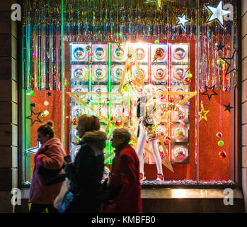 Christmas shop window display at Harvey Nichols store in St Andrews Square Edinburgh, Scotland, United Kingdom Stock Photo