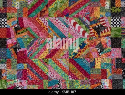 Zig Zag Stripes and Squares  of Bright Colors on Quilt Stock Photo
