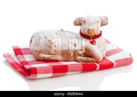 Easter Lamb Cake on red towel isolated on white Stock Photo