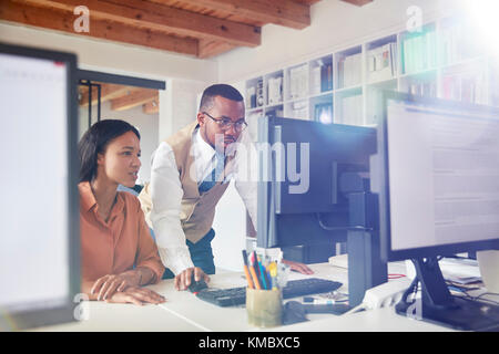 Business people using computer in office Stock Photo