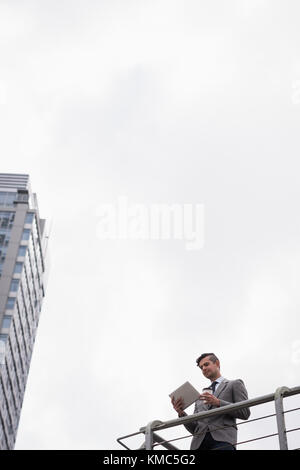 Businessman using digital tablet Stock Photo