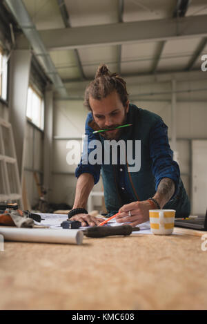 Carpenter drawing on paper Stock Photo