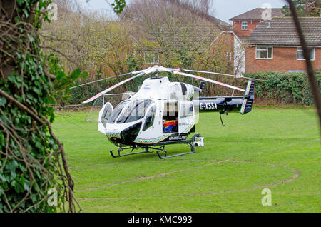 Maidstone, Kent, UK. Kent, Surrey and Sussex Air Ambulance G-KSSA landed on a school playing field (Brunswick House Primary School, Maidstone) waiting Stock Photo