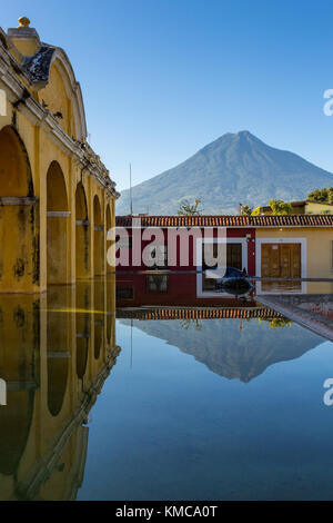 Tanque de la Unión with the Agua volcano in the background | Antigua | Guatemala Stock Photo